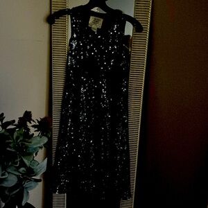 Cocktail dress. Color black beautiful beading’s.